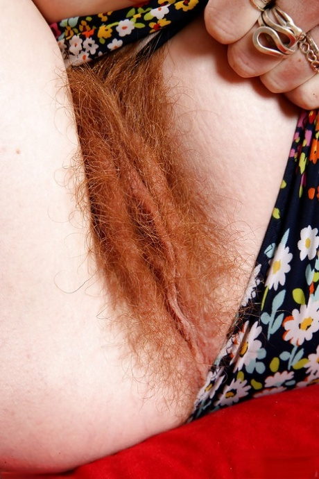 Close-up of redheaded mommy's hairy pussy.
